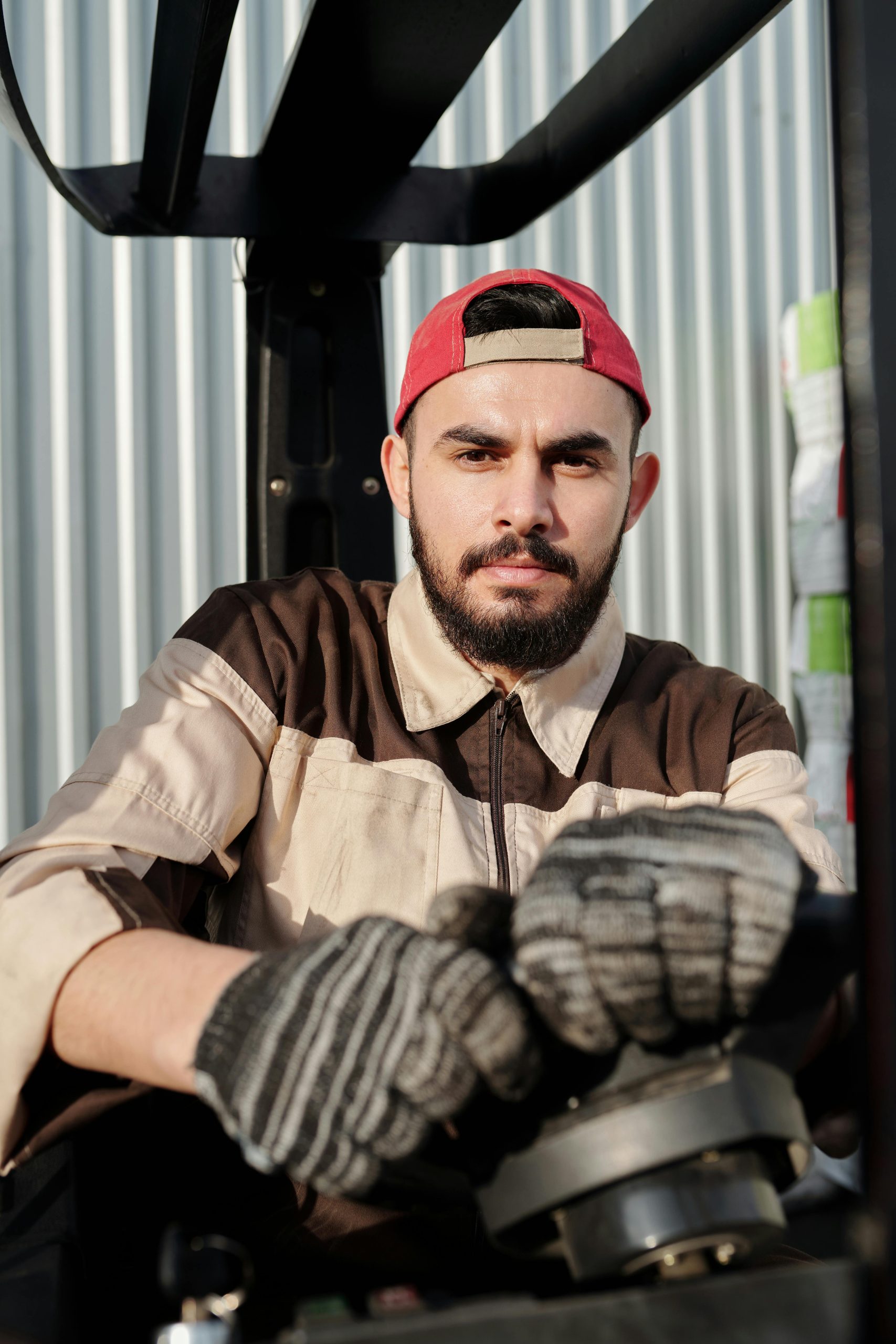 Close up photo of man holding steering wheel